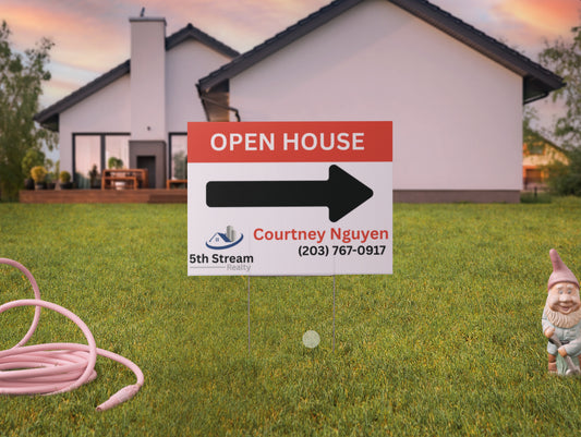 Open house sign in front of a house with a garden gnome and coiled hose.